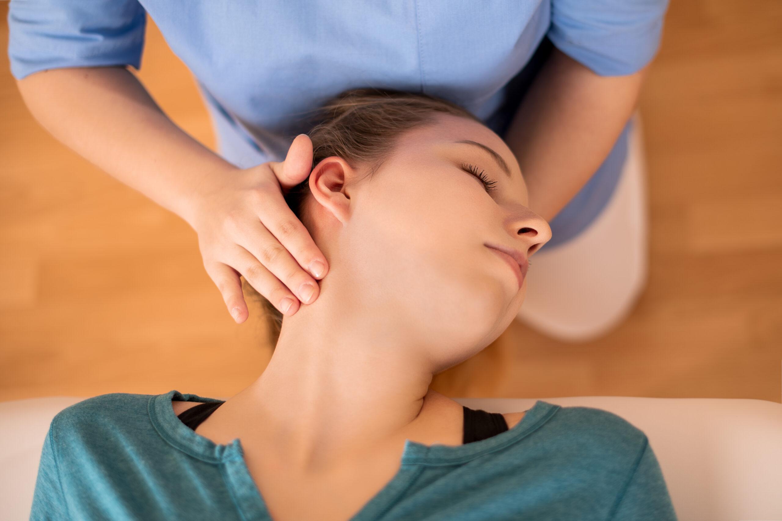 woman getting a chiropractic adjustment